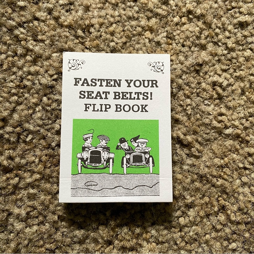 FLIPIX Animated Motion Picture FLIP BOOK "Fasten Your Seat Belts” vintage gag